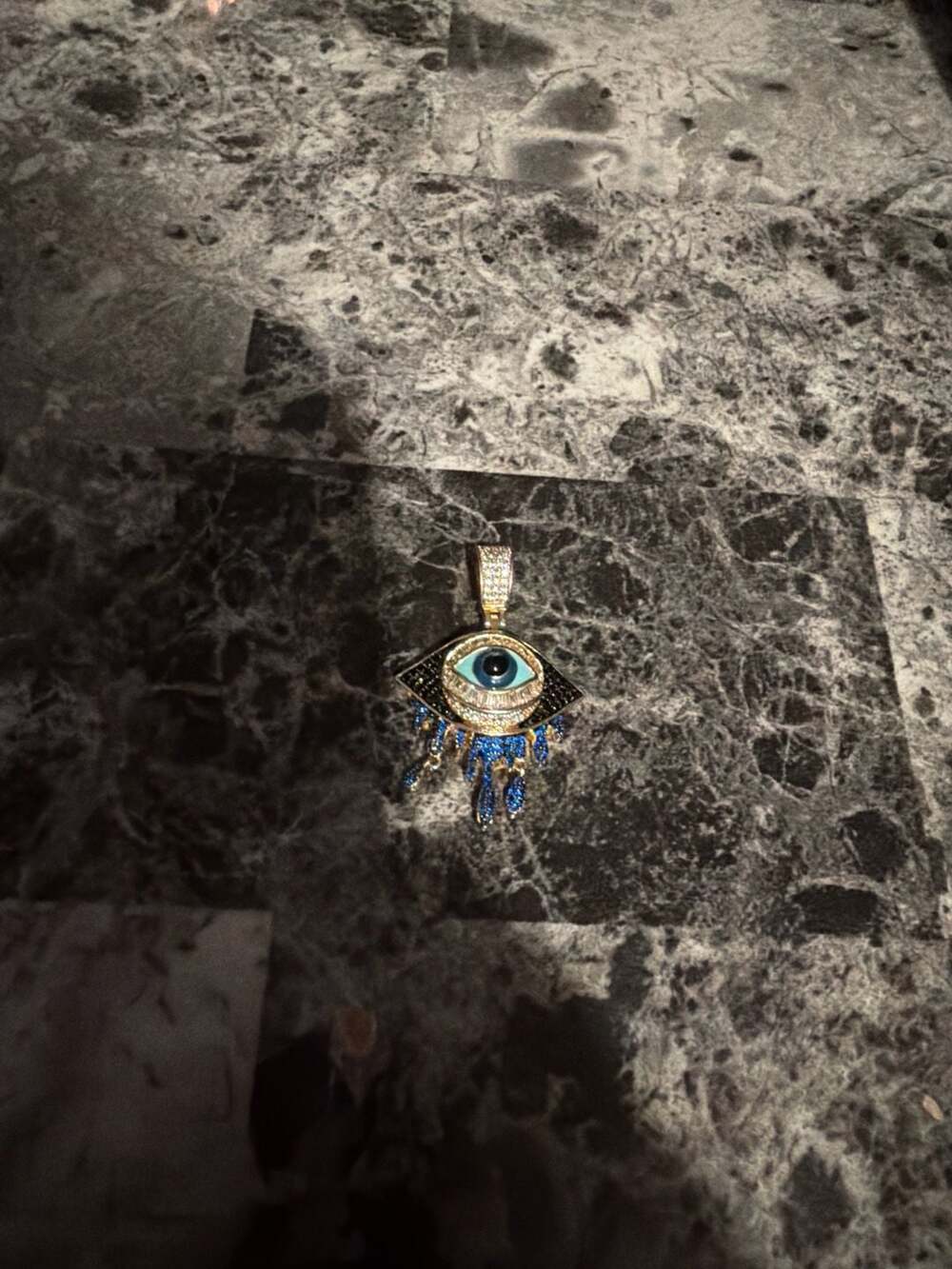 Iced Out Dripping Evil Eye Pendant with Blue & Black CZ Stones
